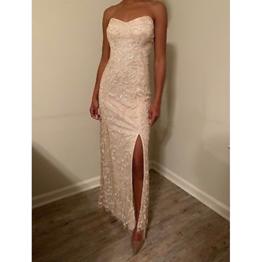Form fitting beaded Prom Dress